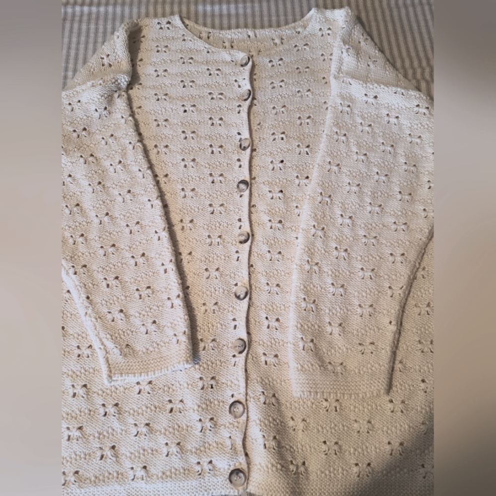 Long Sleeve Knitted Cardigan. Cream color.